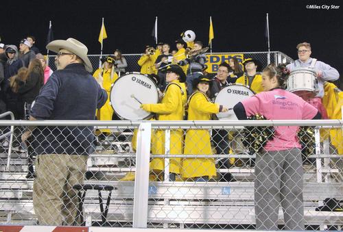 Caption: The Custer County District High School band, under the direction of Mike Gillan, left, delivers a drum roll in preparation for the kickoff at Friday’s football game at Connors Stadium in Miles City. The Cowboys won, beating previously undefeated Sidney 28-0. (STAR PHOTO/Sharon Moore)